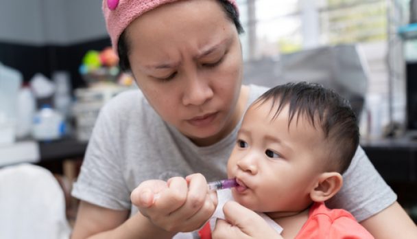 Asian,Cute,Baby,Boy,Taking,A,Liquid,Drug,After,A