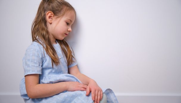 Sad,Depressed,Pensive,Little,Girl,Sitting,On,The,Floor,Stressed